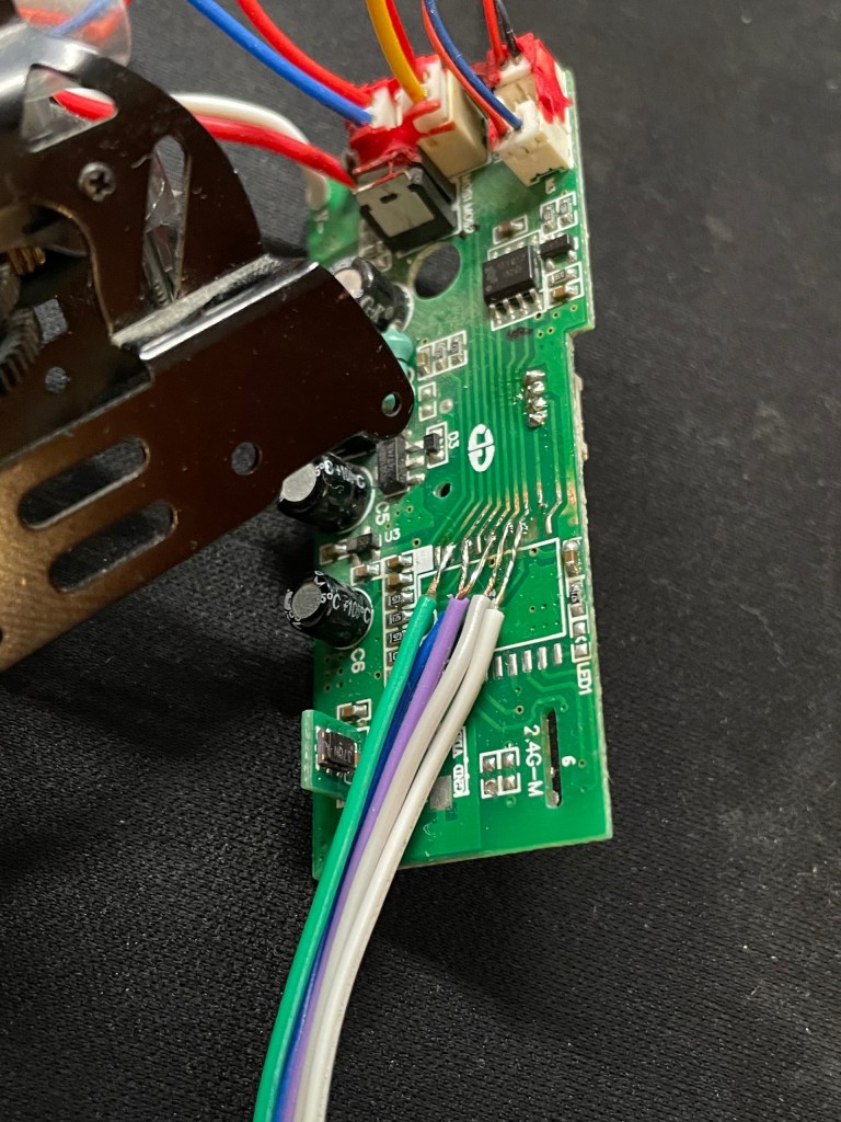 Control circuit board with wires soldered to the traces.